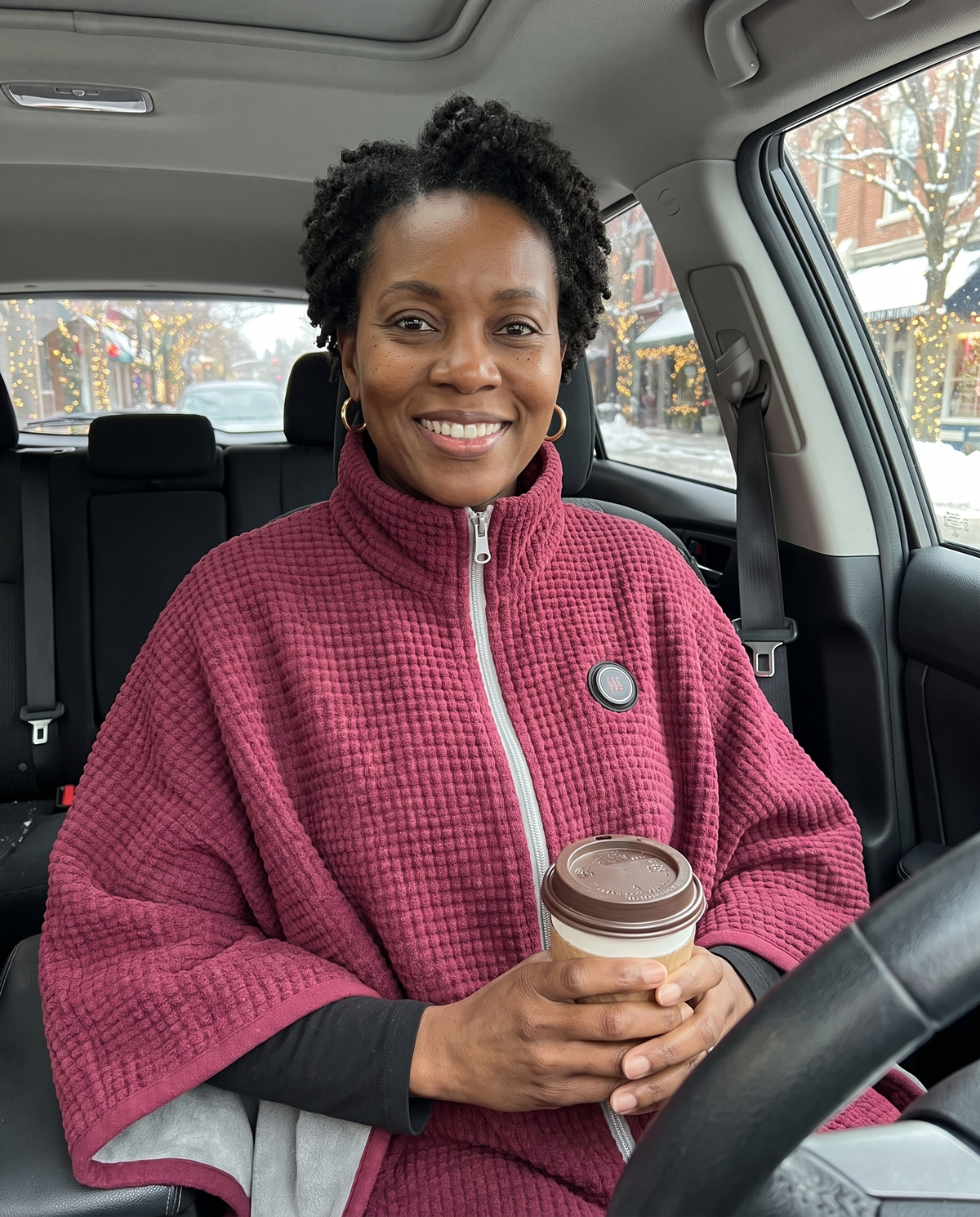 Wearing Warmpeak in Burgundy in the car